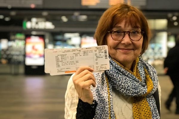 Karen-with-her-train-tickets