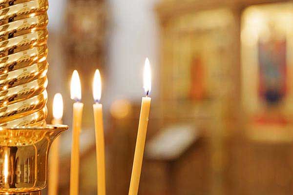 Light a Candle at the Church of Agioi Konstantinos and Eleni